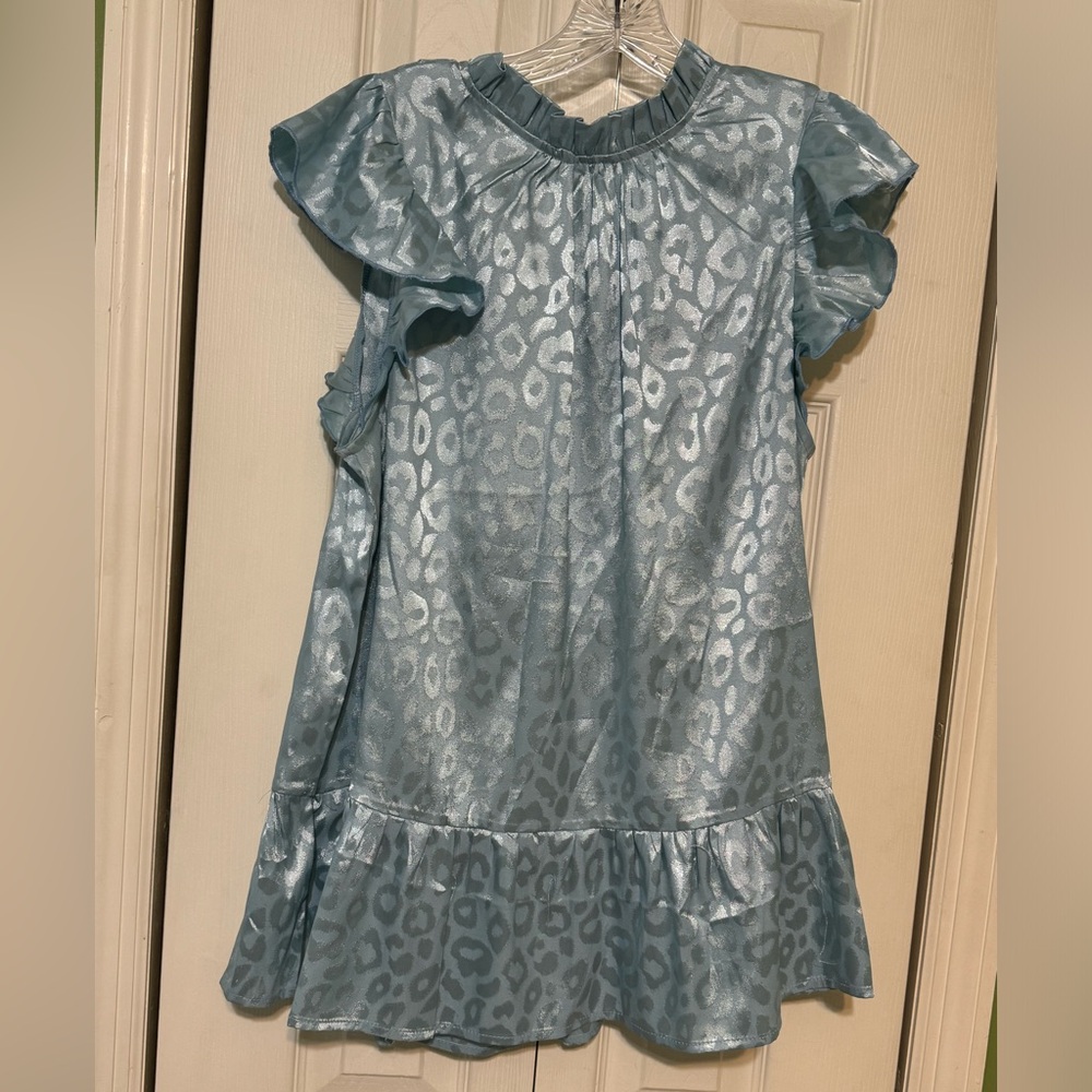Blue shiny cheetah print top